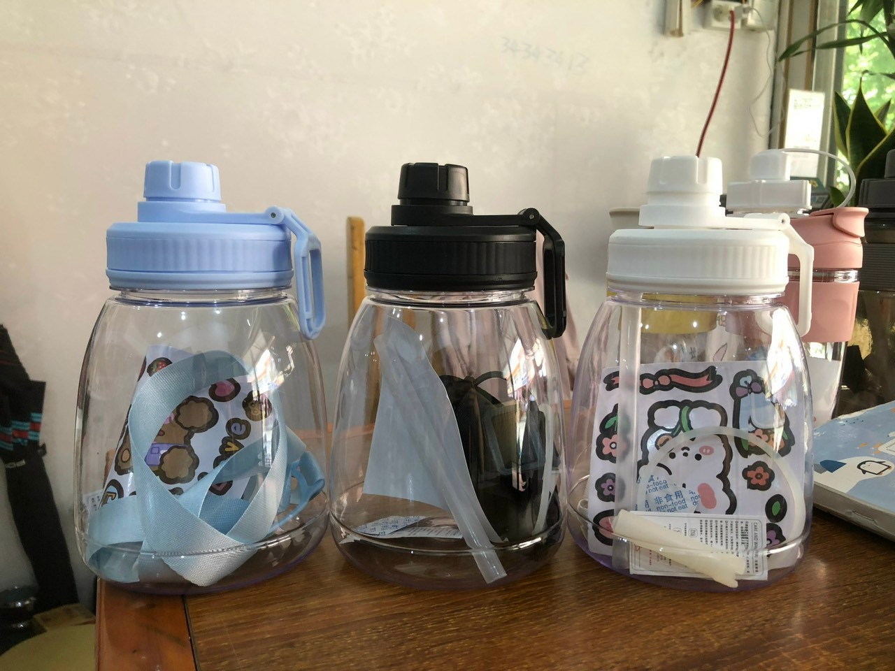 20240620_DQW4sd5IkS Bình nhựa trong đựng nước hình bầu dục kèm sticker (Kiện 60 cái)